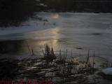 Cloudy Setting Sunlight Reflected on Ice, Elginwood Pond