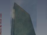 Glass Monolith With Clouds and Reflections