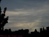 Prelude to a Sunset, Clouds and Rooftop Silhouettes