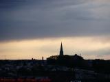 St. Francis De Sales Church Against Heavy Sunset Clouds
