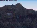 Snow in Hills Near Red Rock Canyon Against Sunset Sky