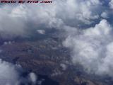 Partly Sunny Skies Below, Perspective From 36,000 Feet