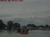 Gull Over Lobster Boats Under Mostly Cloudy Skies, Saugus