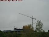 A Trio of Cranes Working on the Casino Under Cloudy Skies