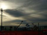 Sun Through Windowed Clouds Over Construction, Somerville
