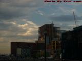 Construction on the Waterfront Under Changing Sunset Skies