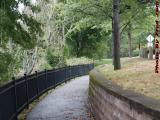 A Curve in the Riverwalk Under Clouds at Gateway Plaza