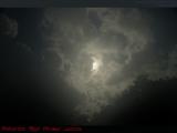 Our Star Shining Through the Space of Earth's Clouds