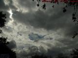 Sun Peeking Through Broken Cloudscape, Sunrise, Florida